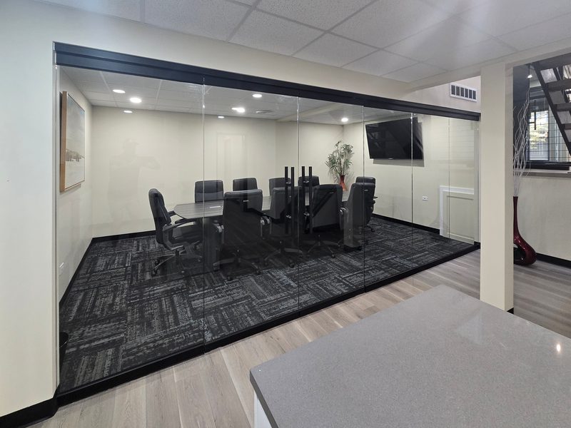 Glass-walled conference room included with membership
