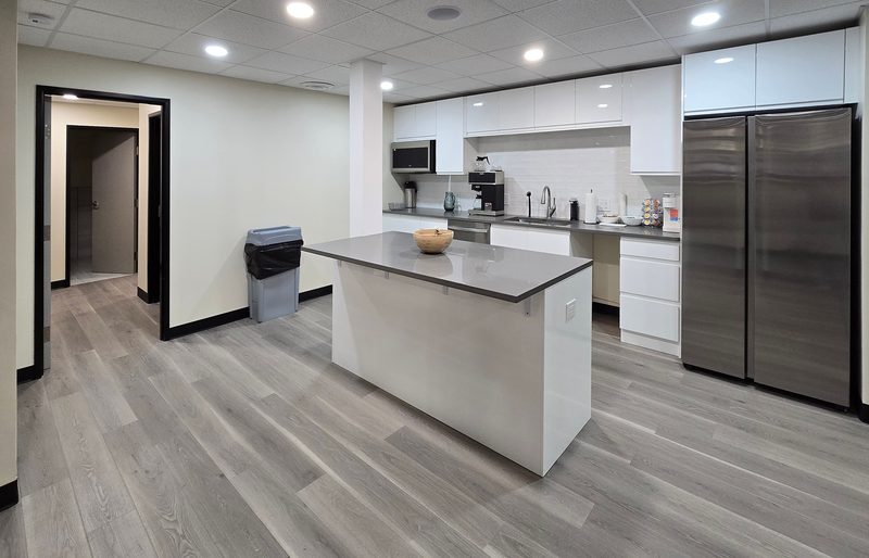 Kitchen with island, coffee and snacks at ZipDesk Coworking